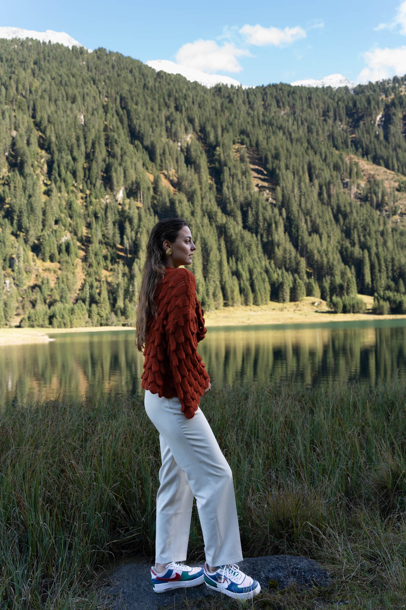 Red knitted sweater with wide sleeves